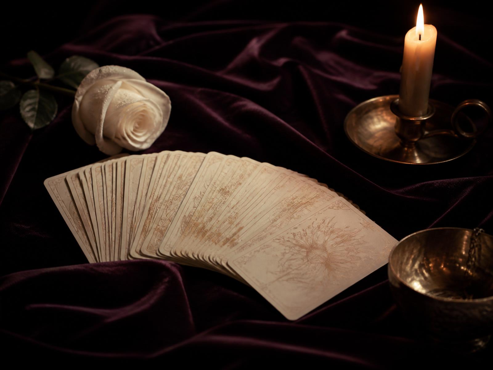 Tarot deck and ritual candle